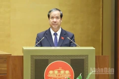 Bộ trưởng Giáo dục và Đào tạo Nguyễn Kim Sơn trả lời chất vấn của các đại biểu Quốc hội. (Ảnh: DUY LINH)
