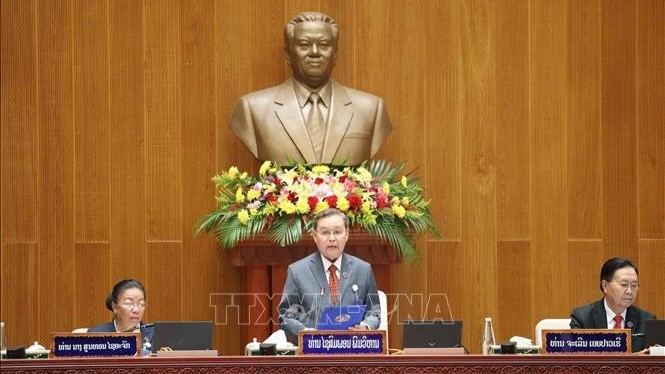 Đồng chí Xaysomphon Phomvihane, Ủy viên Bộ Chính trị, Chủ tịch Quốc hội khóa IX của Lào phát biểu khai mạc Kỳ họp. (Ảnh: Xuân Tú/PV TTXVN tại Lào)