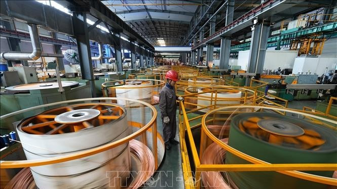 Đồng được sản xuất tại nhà máy ở tỉnh Chiết Giang, Trung Quốc. (Ảnh tư liệu: THX/TTXVN) 