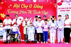 Bệnh viện K đem không khí Tết đến với bệnh nhân đang điều trị ở tất cả các cơ sở trên địa bàn Hà Nội. (Ảnh: GIANG NAM)