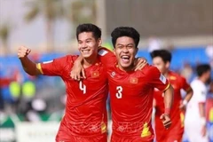 Trung vệ Hiểu Minh ghi bàn nâng tỷ số 2-0 cho U23 Việt Nam trong trận đấu với Jordan tối 6/1. (Ảnh: AFC/TTXVN)