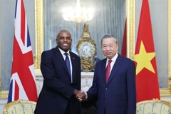 Tổng Bí thư Tô Lâm gặp Phó Thủ tướng Anh David Lammy. (Ảnh: Thống Nhất/TTXVN)