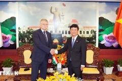 Phó Bí thư Thành ủy, Chủ tịch Hội đồng Nhân dân Thành phố Hồ Chí Minh Võ Văn Minh tiếp Chủ tịch Quốc hội Hungary Kover Laszlo. (Ảnh: TTXVN)