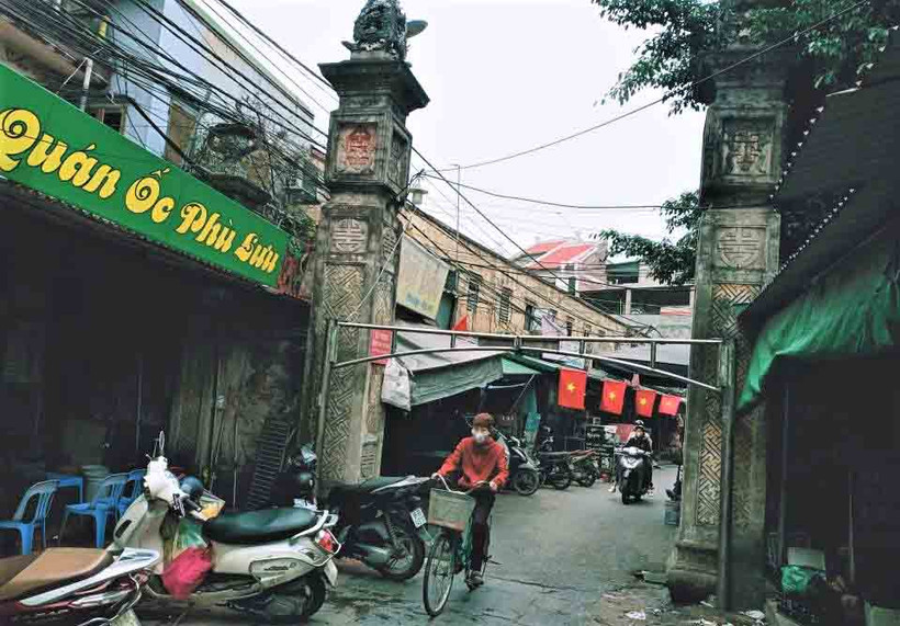 Cổng chợ xưa có lịch sử hơn 100 năm.