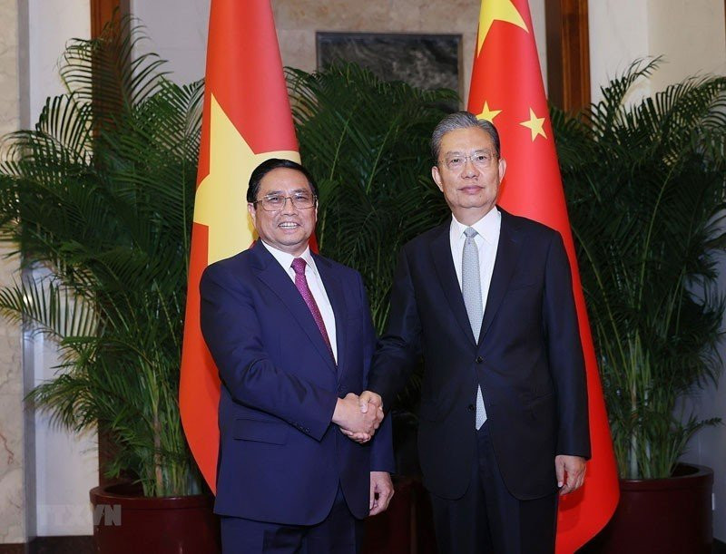 Thủ tướng Phạm Minh Chính hội kiến Ủy viên trưởng Nhân đại Toàn quốc Trung Quốc Triệu Lạc Tế. 