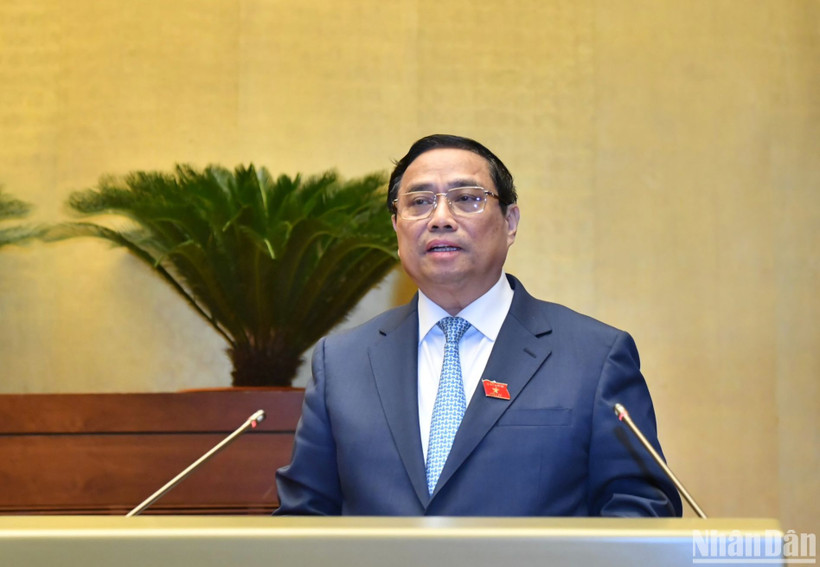 Thủ tướng Phạm Minh Chính trình bày báo cáo giải trình và trả lời chất vấn của Chính phủ tại Kỳ họp thứ 6, Quốc hội khóa XV. (Ảnh: ĐĂNG KHOA)