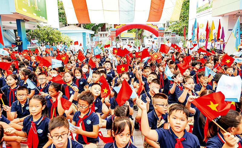 Niềm vui ngày khai giảng của học sinh Trường tiểu học Đoàn Thị Điểm. (Ảnh HOÀNG GIANG) 