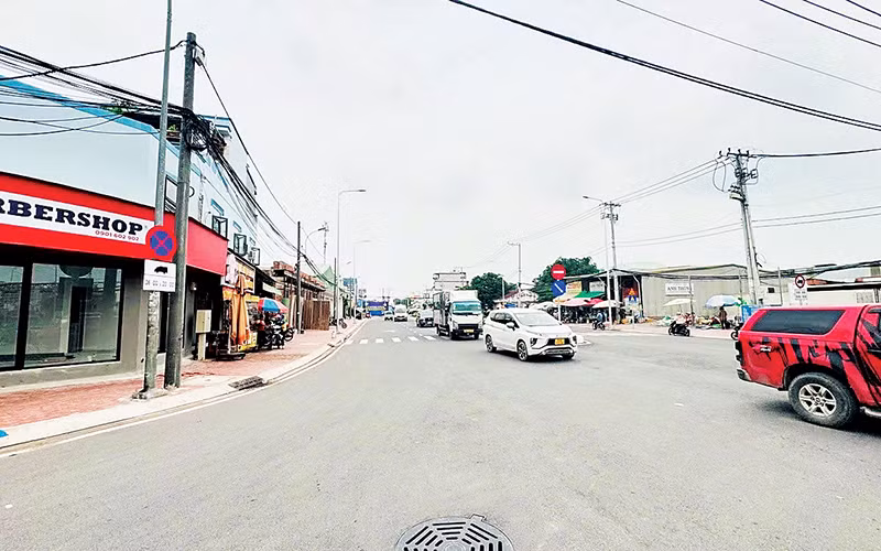 Đường Hưng Nhơn, xã Tân Kiên, huyện Bình Chánh sau khi được nâng cấp, mở rộng, không còn tình trạng ngập nước.