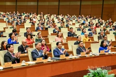 Lãnh đạo Đảng, Nhà nước cùng các đại biểu Quốc hội tham dự phiên họp. (Ảnh: DUY LINH)