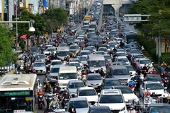 Xe cộ lưu thông trên trục đường Trường Chinh-Ngã Tư Sở (Hà Nội). (Ảnh minh họa: THÀNH ĐẠT)