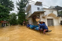 Mưa lũ gây ngập lụt tại thành phố Huế. (Ảnh: QUANG TIẾN)