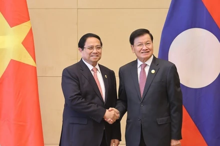 Thủ tướng Phạm Minh Chính hội kiến Tổng Bí thư, Chủ tịch nước Lào Thongloun Sisoulith. (Ảnh: VGP/Nhật Bắc)