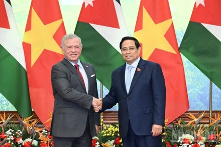 Thủ tướng Phạm Minh Chính và Quốc vương Jordan Abdullah II Ibn Al-Hussein. (Ảnh: Trần Hải)