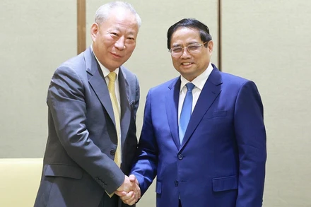 Thủ tướng Phạm Minh Chính tiếp Chủ tịch Tập đoàn xây dựng Thái Bình Dương Nghiêm Giới Hoà. (ẢNH: TTXVN)