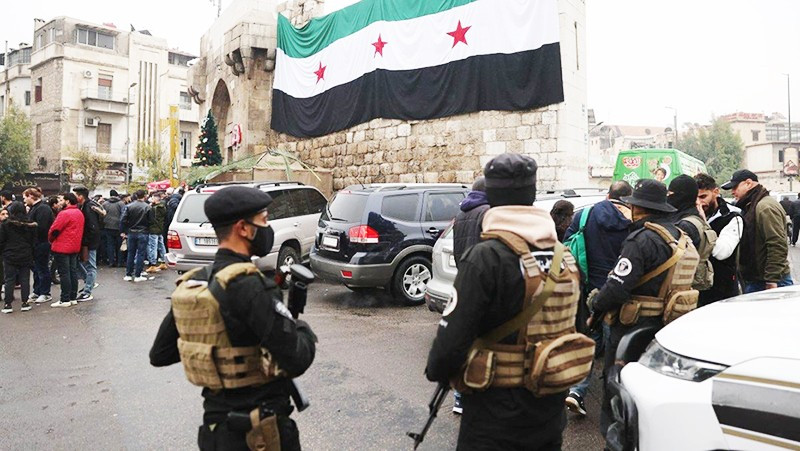 Lực lượng an ninh Syria bảo vệ một sự kiện tại Thủ đô Damas. Ảnh: CNN