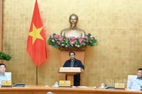 Thủ tướng Chính phủ Phạm Minh Chính chủ trì cuộc họp về đánh giá tình hình thực hiện mô hình chính quyền địa phương 2 cấp. (Ảnh: TRẦN HẢI)