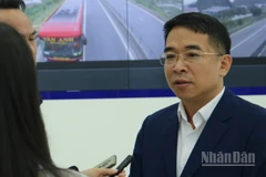 Phó Cục trưởng Cục Đường bộ Việt Nam Nguyễn Viết Huy trả lời phỏng vấn Báo Nhân Dân.