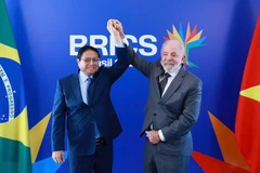 Thủ tướng Phạm Minh Chính và Tổng thống Cộng hòa Liên bang Brazil Lula da Silva. (Ảnh: Dương Giang - TTXVN)