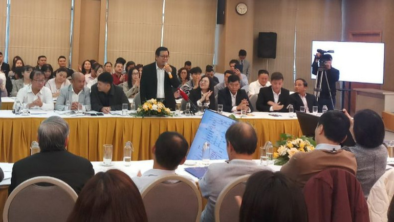 Đại diện doanh nghiệp phát biểu ý kiến tại hội thảo.