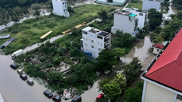 Khung cảnh tại một khu dân cư tại Quận 7 chiều nay. (Ảnh: TTXVN)