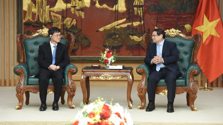 Thủ tướng Chính phủ Phạm Minh Chính tiếp đồng chí Bùi Kim Giai, Bộ trưởng Bộ Công tác về quân nhân xuất ngũ Trung Quốc. (Ảnh: TRẦN HẢI)