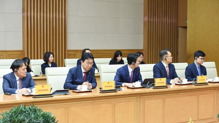 Ban lãnh đạo Tập đoàn SK tham dự buổi tiếp. (Ảnh: TRẦN HẢI)