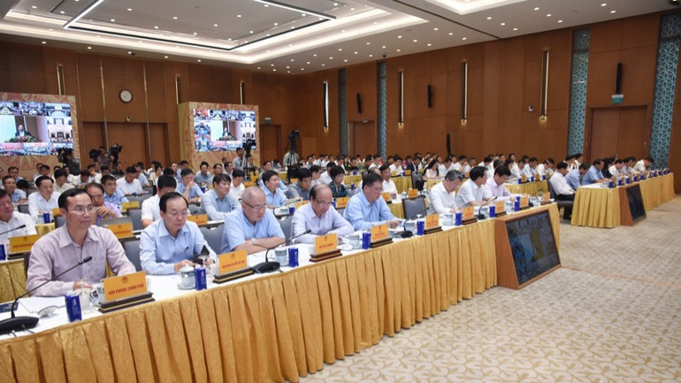 Các đồng chí lãnh đạo, đại biểu tham dự hội nghị (Ảnh: THANH GIANG).