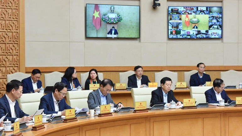 Các thành viên Chính phủ, đại biểu tham dự phiên họp. (Ảnh: TRẦN HẢI)