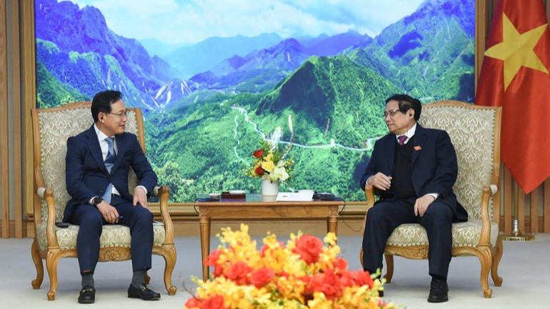 Thủ tướng Phạm Minh Chính tiếp Tổng giám đốc Samsung Việt Nam Choi Joo Ho chuẩn bị kết thúc nhiệm kỳ. (Ảnh: TRẦN HẢI)