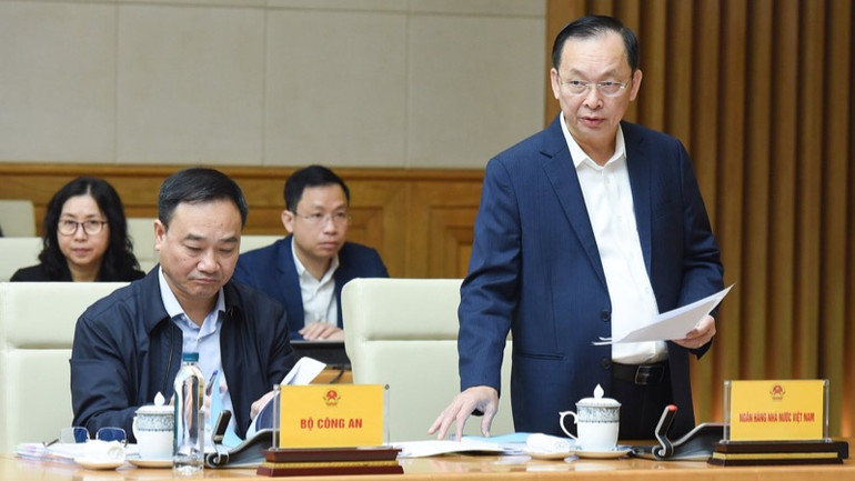 Lãnh đạo Ngân hàng Nhà nước Việt Nam phát biểu ý kiến tại Hội nghị. (Ảnh: TRẦN HẢI)