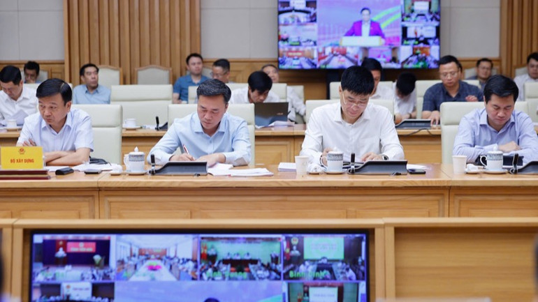 Các đại biểu tham dự phiên họp. (Ảnh: TRẦN HẢI) Các đại biểu tham dự phiên họp. (Ảnh: TRẦN HẢI)