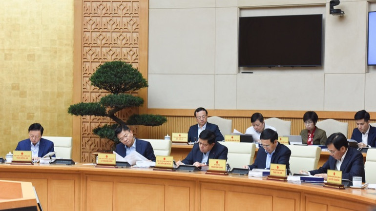 Các thành viên Chính phủ, đại biểu tham dự phiên họp.