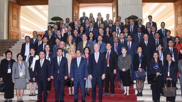 Thủ tướng Phạm Minh Chính với Đoàn doanh nghiệp USABC. (Ảnh: TRẦN HẢI)