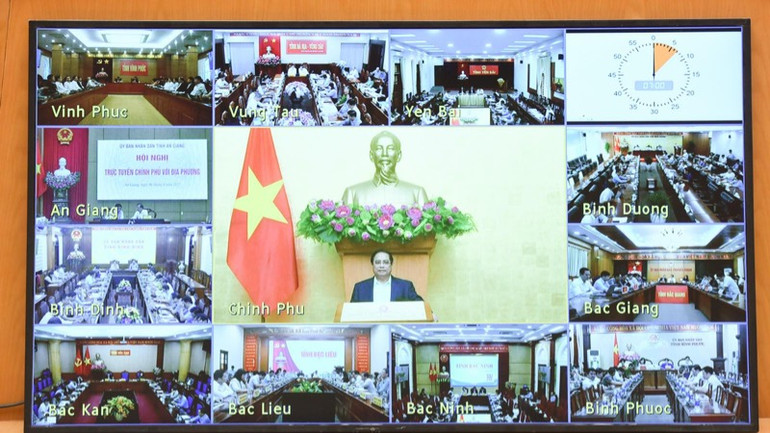 Phiên họp được truyền trực tuyến tới Ủy ban nhân các tỉnh, thành phố trực thuộc Trung ương. (Ảnh: TRẦN HẢI)