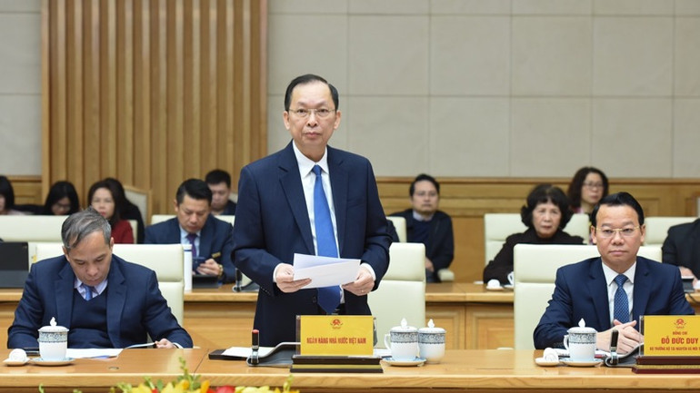 Phó Thống đốc Ngân hàng Nhà nước Việt Nam Đào Minh Tú phát biểu ý kiến tại Hội nghị (Ảnh; TRẦN HẢI).