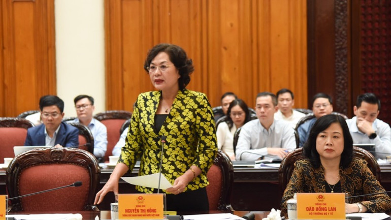 Thống đốc Ngân hàng Nhà nước Việt Nam Nguyễn Thị Hồng phát biểu ý kiến tại cuộc họp. (Ảnh: TRẦN HẢI)