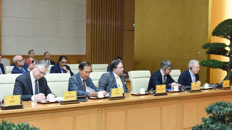 Các đại biểu phía Hoa Kỳ tham dự buổi tiếp. (Ảnh: TRẦN HẢI)