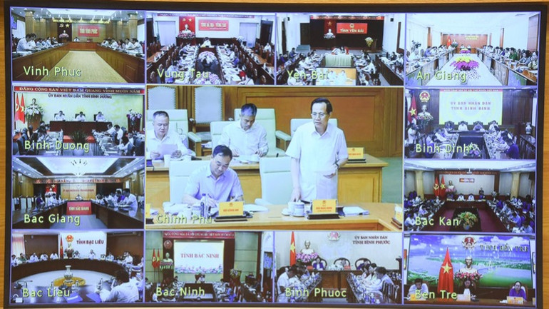 Phiên họp được truyền trực tuyến đến 63 tỉnh, thành phố trực thuộc Trung ương. (Ảnh TRẦN HẢI).