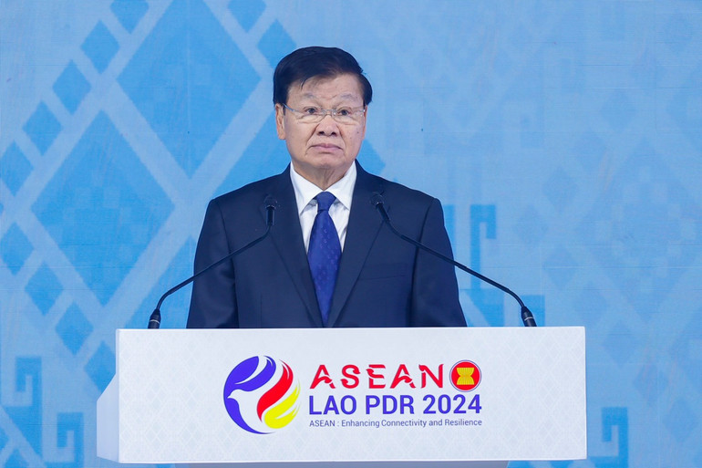 Tổng Bí thư, Chủ tịch nước Lào Thongloun Sisoulith phát biểu ý kiến tại phiên khai mạc. (Ảnh: Nhật Bắc/VGP)