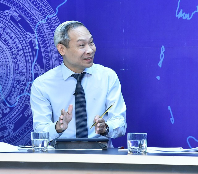 Ủy viên Thường trực Ủy ban Kinh tế của Quốc hội Phan Đức Hiếu trao đổi tại toạ đàm. (Ảnh: VGP)