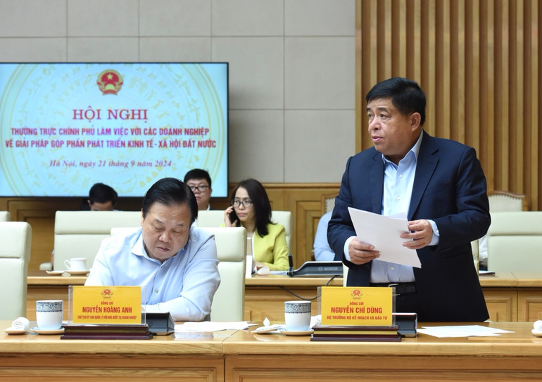 Bộ trưởng Kế hoạch và Đầu tư Nguyễn Chí Dũng phát biểu ý kiến tại hội nghị. (Ảnh: TRẦN HẢI)