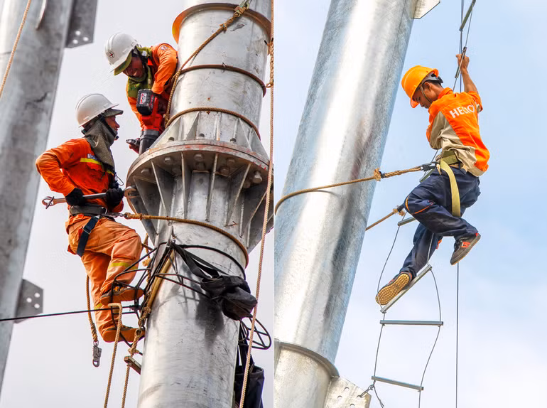 Thi công lắp dựng cột của Đường dây 500kV mạch 3. (Ảnh: EVNICT)