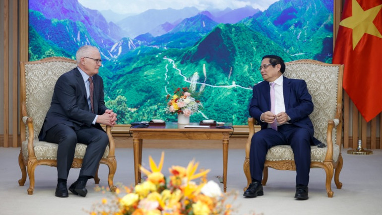 Thủ tướng Phạm Minh Chính tiếp ông John Neuffer, Chủ tịch Hiệp hội Công nghiệp bán dẫn Hoa Kỳ (SIA). (Ảnh: TRẦN HẢI)