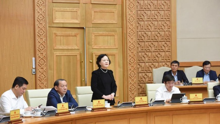 Bộ trưởng Nội vụ Phạm Thị Thanh Trà báo cáo tại Hội nghị. (Ảnh: Trần Hải)