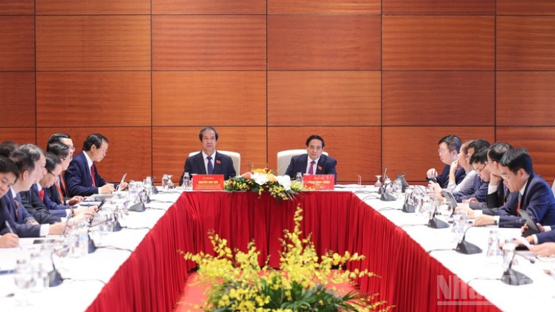 Quang cảnh phiên thảo luận tại tổ. (Ảnh: Trần Hải)