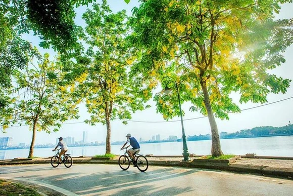 Quang cảnh buổi lễ ra mắt "Hướng dẫn thiết kế đường dành cho xe đạp trong đô thị".