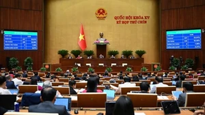 Quốc hội thông qua Luật sửa đổi, bổ sung một số điều của Luật Mặt trận Tổ quốc Việt Nam, Luật Công đoàn, Luật Thanh niên và Luật Thực hiện dân chủ ở cơ sở. (Ảnh: DUY LINH)
