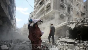 Đống đổ nát sau các cuộc không kích của Israel xuống Dải Gaza. Ảnh: THX/TTXVN
