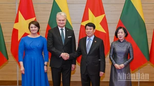 Chủ tịch nước Lương Cường và Phu nhân cùng Tổng thống Litva Gitanas Nauseda và Phu nhân tại chiêu đãi.
