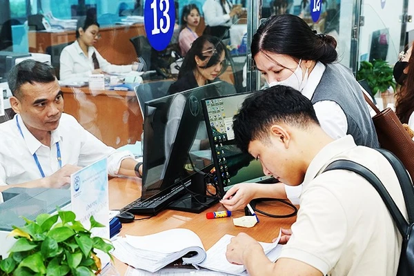 Các thủ tục hành chính được cải cách giúp hoạt động đầu tư, kinh doanh phát triển. Ảnh: BẮC SƠN